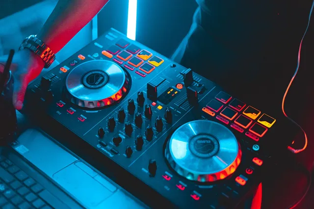 dj, turntable, music, dj equipment, sound, audio, disco, club, dark, closeup, dj, dj, music, disco, disco, disco, disco, disco, club, club, club. A compliance overview for American DJs working across state lines
